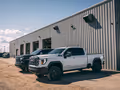 Trucks outside workshop thumbnail