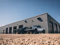 Trucks outside workshop thumbnail